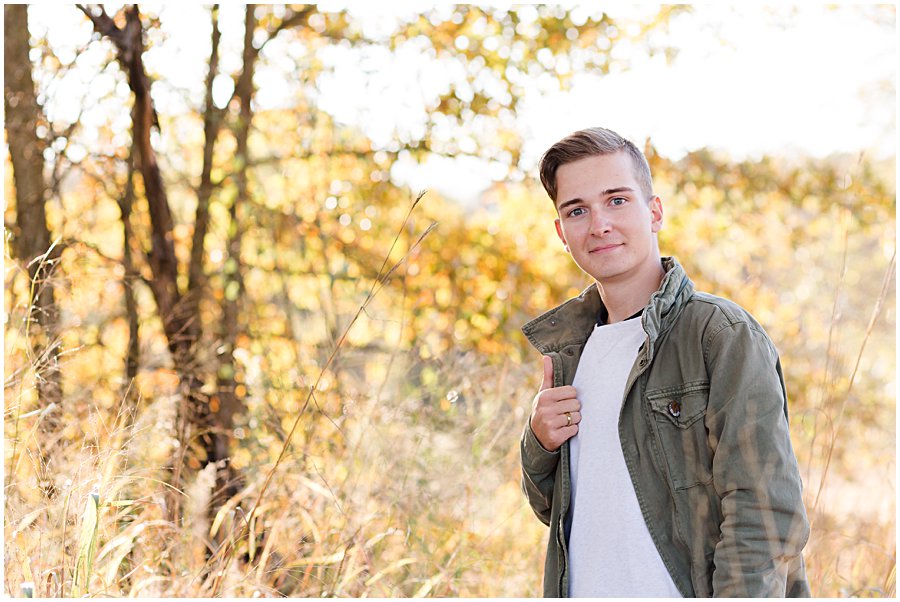 sippo lake fall senior session, perry high school standing in tall weeds
