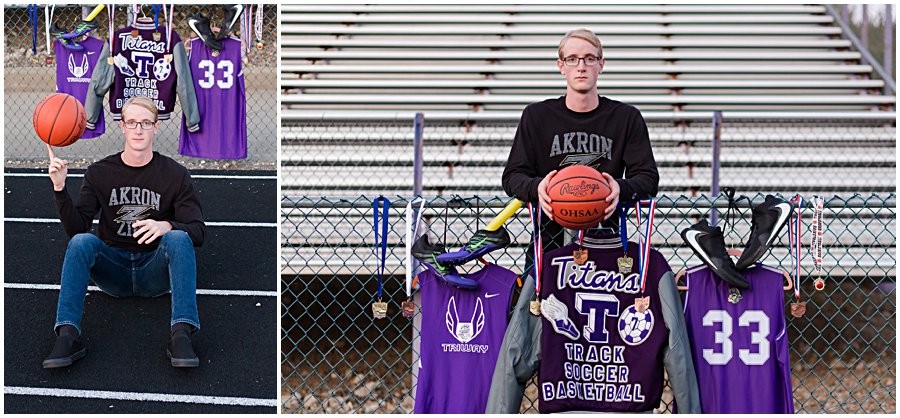 triway high school senior standing by fence with letterman jacket and metals photographed by Jamie Lynette photography