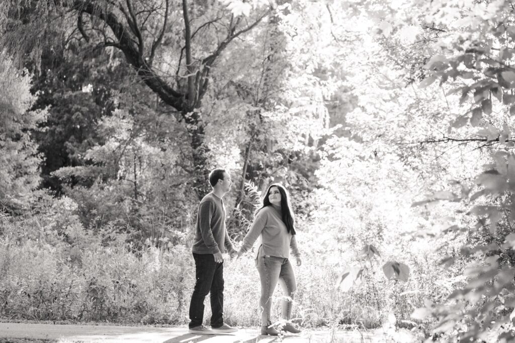 Kayla and Charlie smiling during their Barnes Preserve engagement session