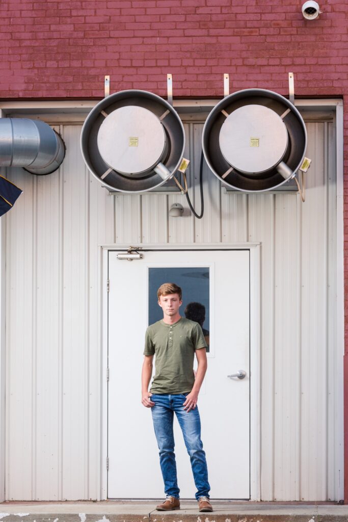 Calum, Triway High School senior, posing in a Wooster