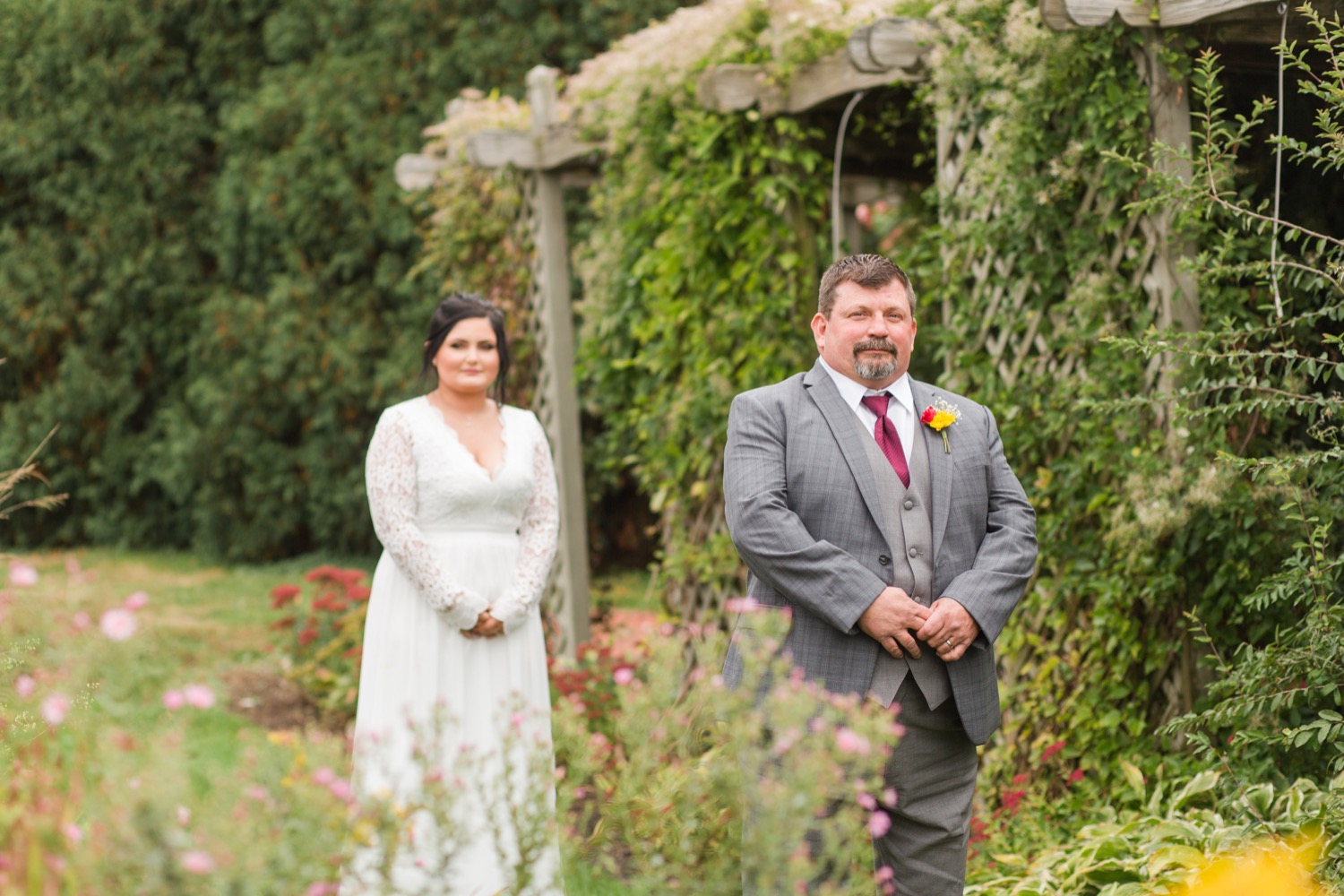 emotional first look with dad at OARDC during fall intimate backyard wedding