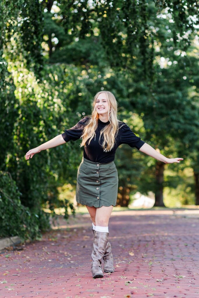 Senior girl photo session with natural green backdrop at OARDC