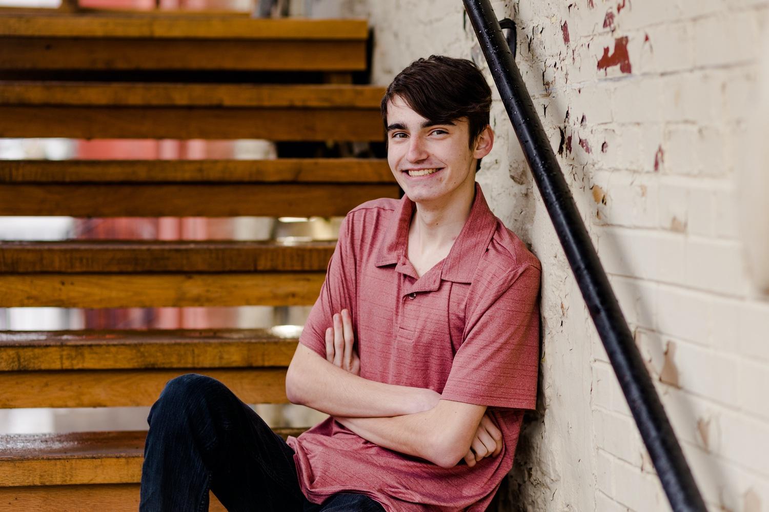 Senior Guy, relaxed pose in unique senior photo session