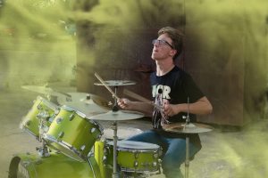 high school senior playing drums