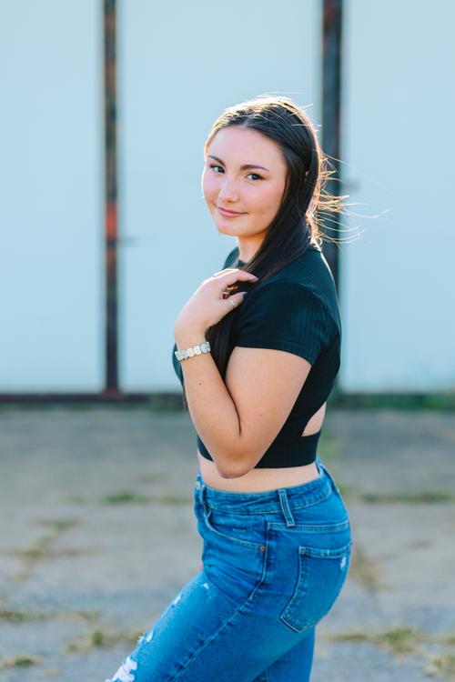 High school girl Abbie smiling during photos