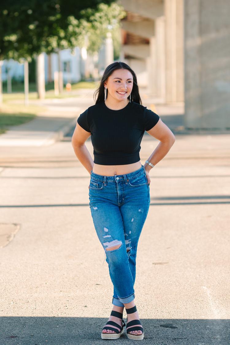 High school girl Abbie smiling during photos