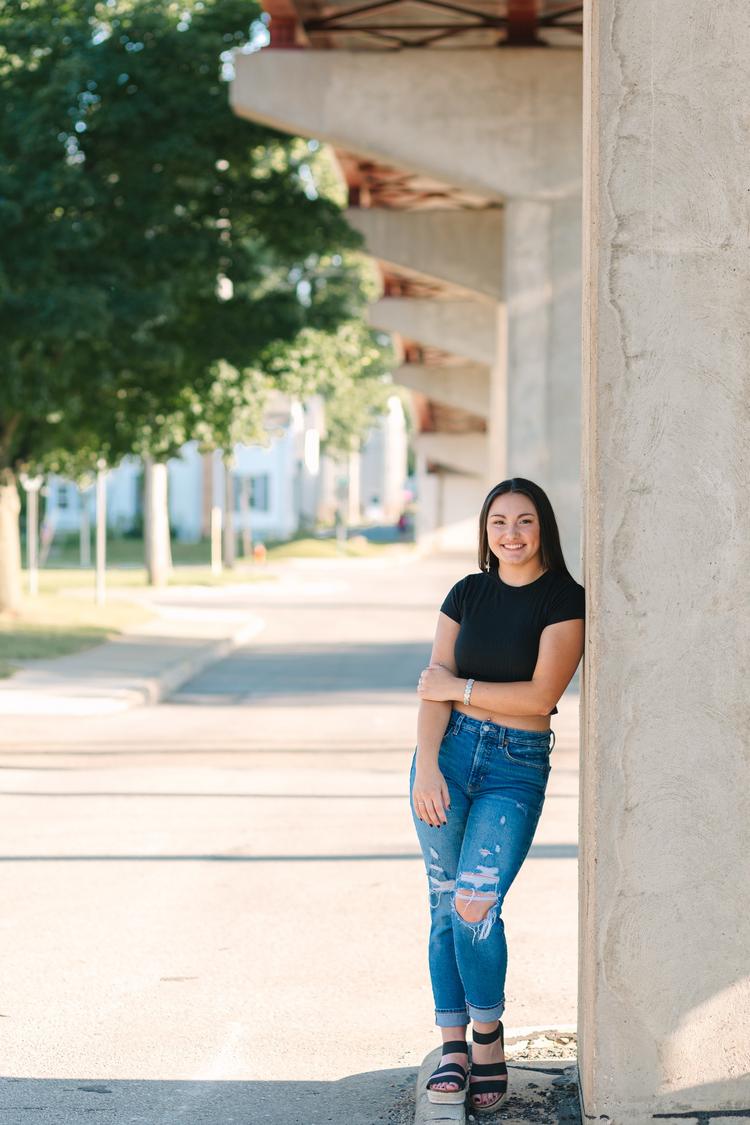 High school girl Abbie smiling during photos