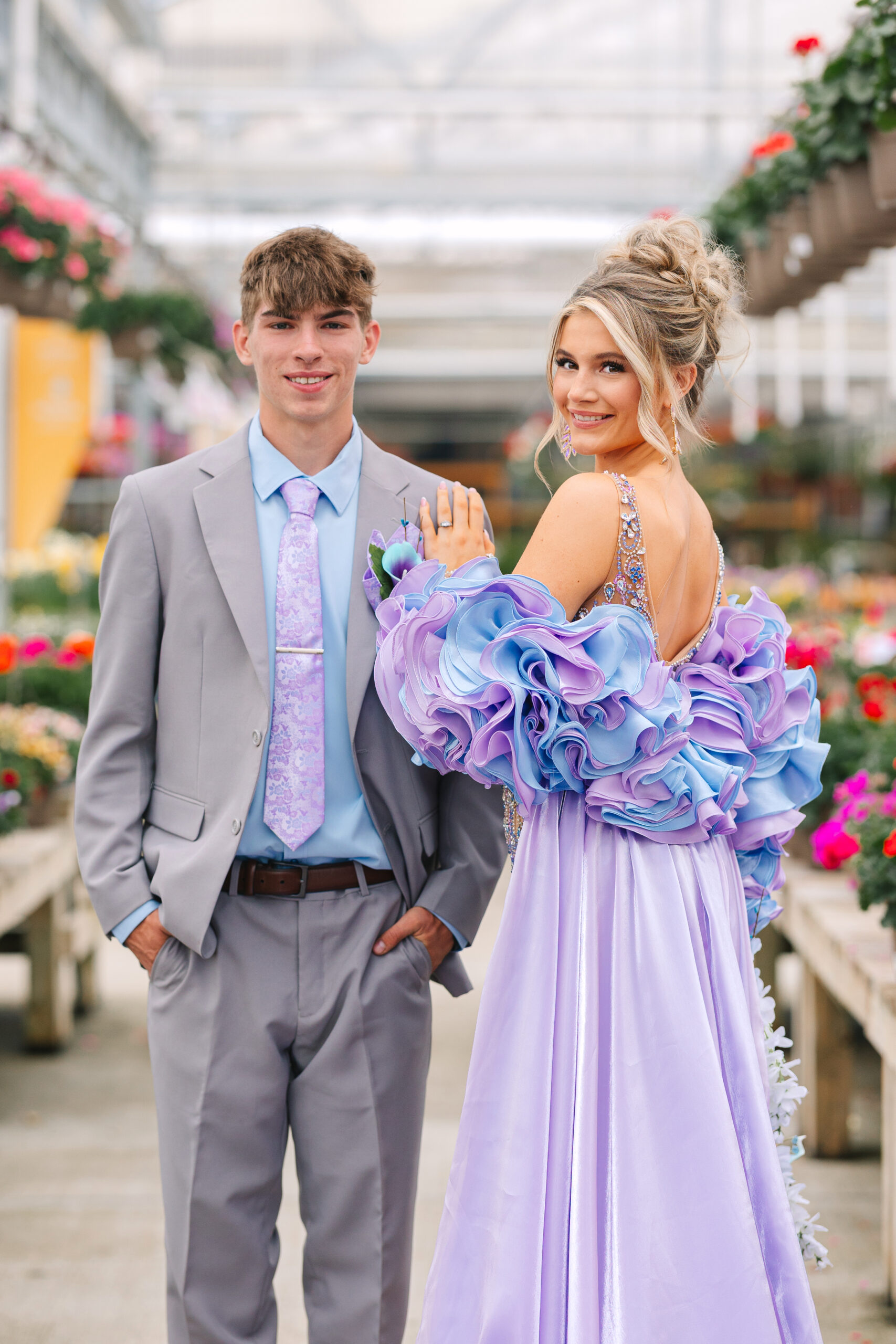 Prom couple Charlee and Anthony in he flowers at Petitti’s Garden Center in Canton, Ohio